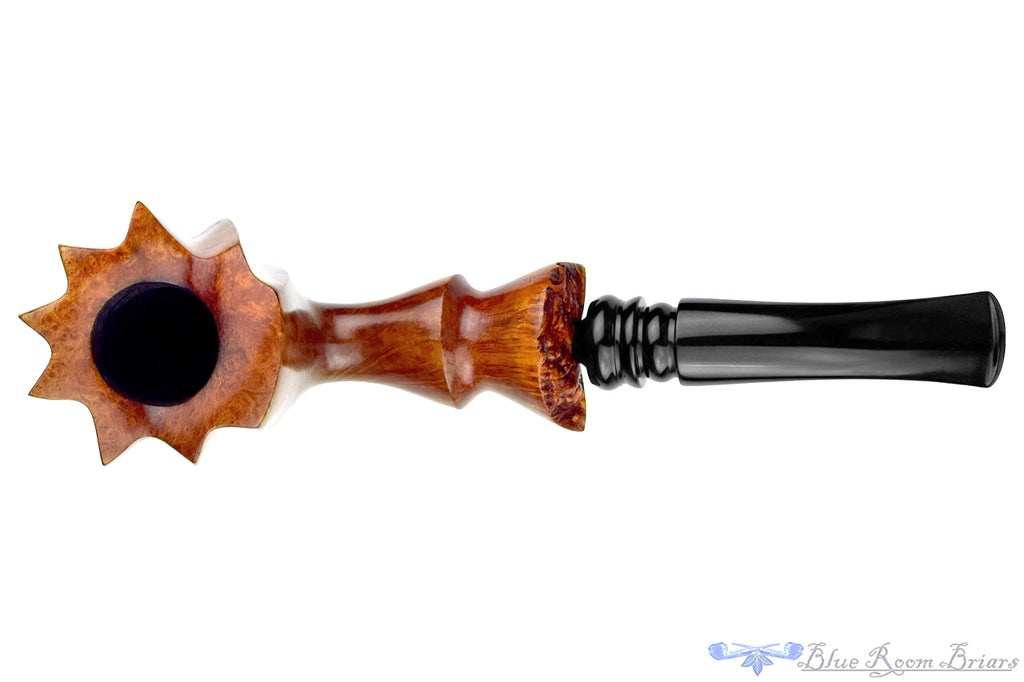 Blue Room Briars is proud to present this Søren Hand-Carved Bent Partial Blast Freehand Sitter with Plateau Estate Pipe